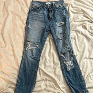 A high waisted straight leg jean. Size 25 in the waist.